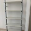 2 columnas de 2m de alto con 5 estantes de 85 x 35